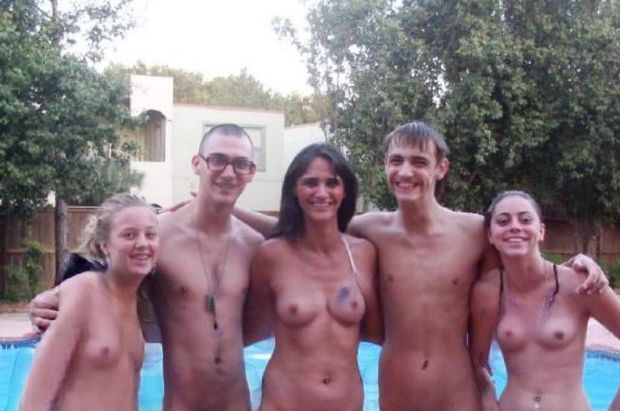Naked family at the pool