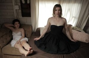 Sexy blonde Ella Nova takes off her dress to spread her pale ass