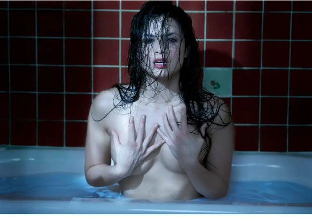 Sexy black hair celebrity in tub
