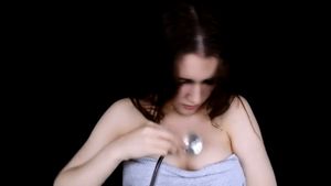 KittyKlaw using a stethoscope