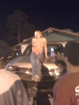 Mom strips down in parking lot before running a train while her daughter films.