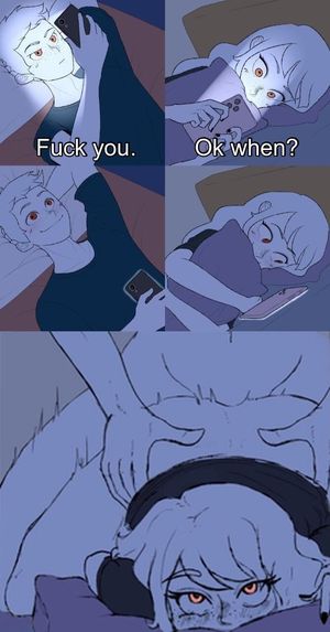 Couple texting in bed