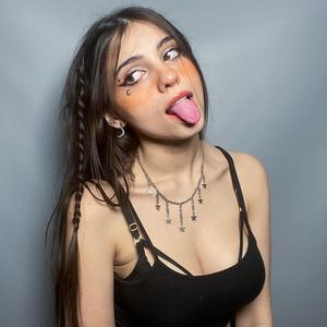 iaaras2 sticks her tongue out