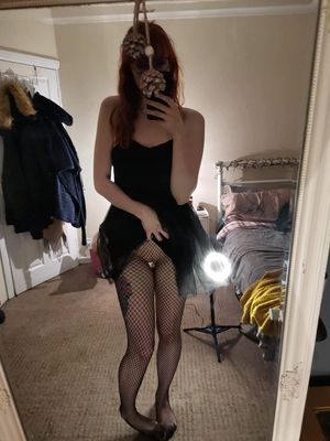amateur redhead in fishnet