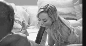 Blake Blossom sucking on huge black pecker