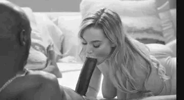 Blake Blossom sucking on huge black pecker