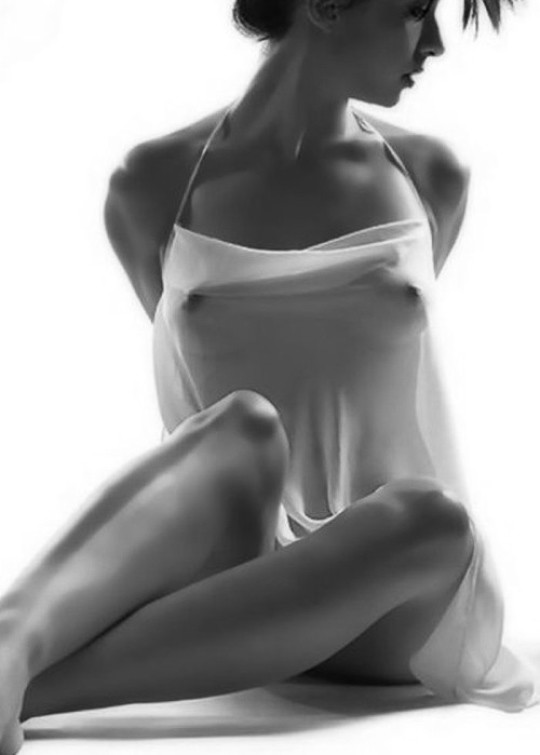 Hands cuffed and helpless, her nipples sprang to attention.