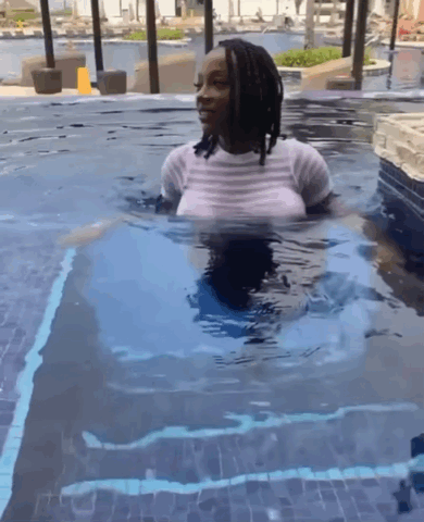 Gorgeous ebony queen stepping out the pool