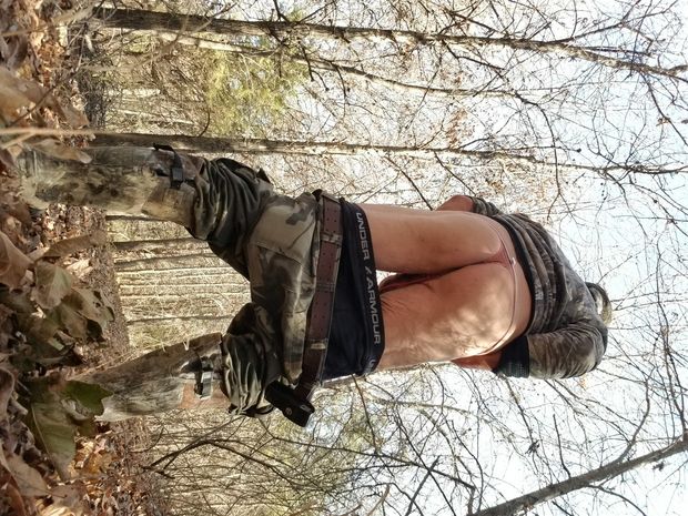 Me in the woods in thong and boots