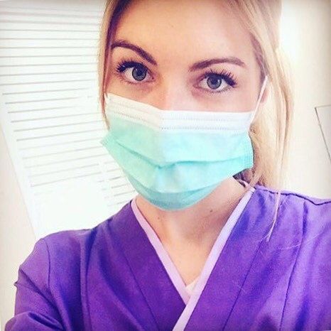 Cute nurse in mask