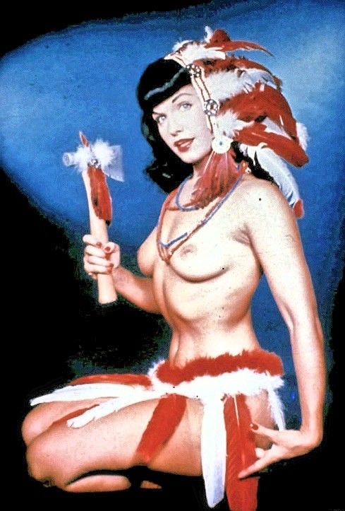 Betty Page revels in her beautiful world of depraved fun