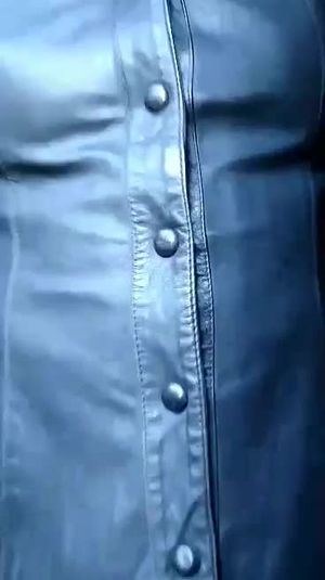 Sissy in leather jacket and leather skirt