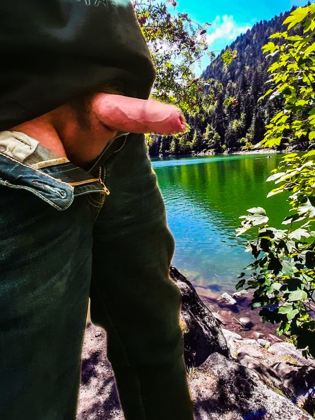 in front of this lake I want to lower my jeans and take out my cock