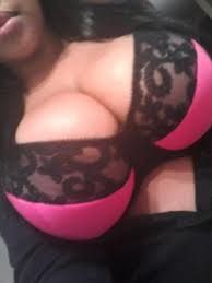 Purple Gaws/Queen Sosa showing off her Beautiful Cleavage in a bra