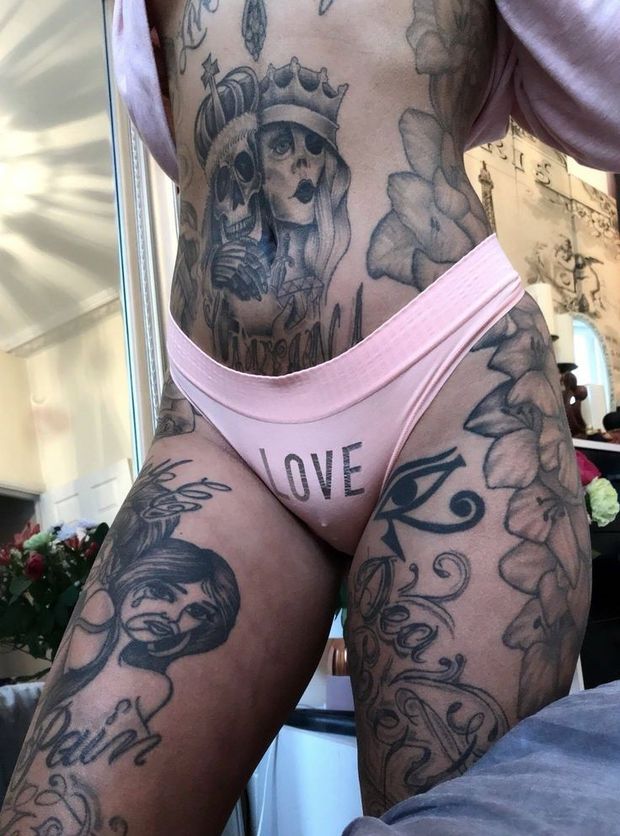 Sexy tattoos and pink panty bulge