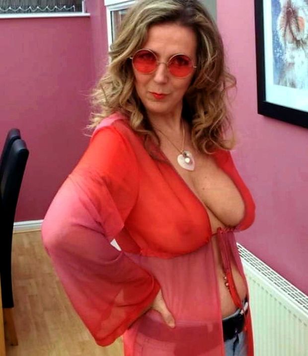 Something about this 60 year old saggy tit whore I find sexy as fuck!  I'd fuck the shit outta her!