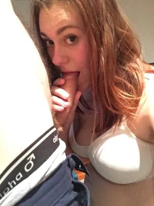 Amateur redhead sucking cock