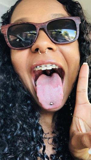 Braces tongue piercing sunglasses