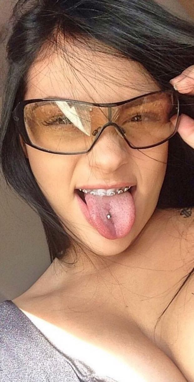 Braces tongue piercing glasses