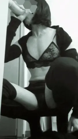Sissy CD slut in lingerie sucks on a dildo