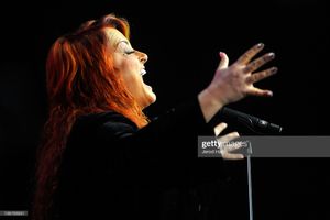 She commands the stage.