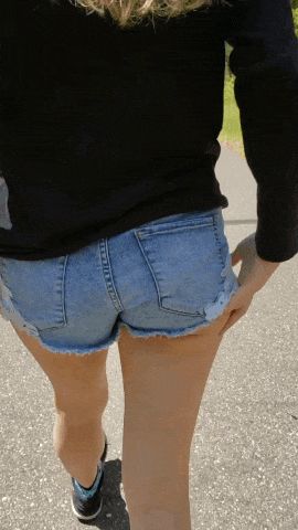 Pulling her shorts up her ass while walking in public