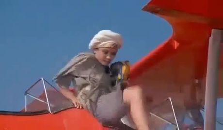 Parachuting & falling out of the sky. (CZJ's first nude appearance & film debut.)