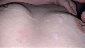 Licking own cum of her tits