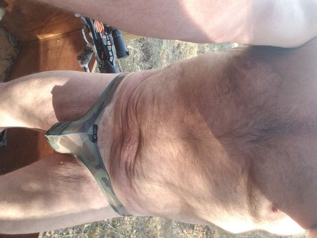 Hunting in thong cock bulging