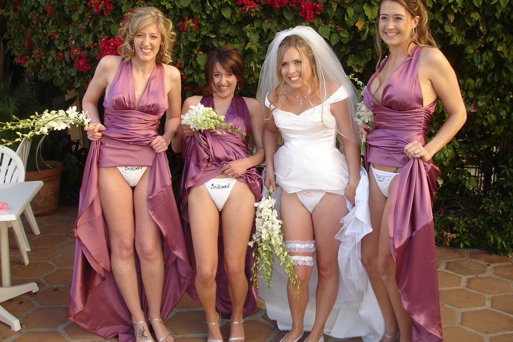 4 ladies with the word "bridesmaid" in panties. Which would go from bridesmaid to potential bride?