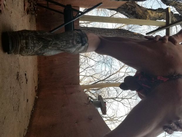 Horny in hunting stand wearing thong
