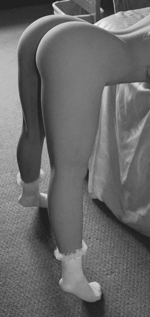 Wearing cute socks and waiting for her bbc