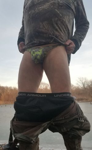 Hiking in thong bulging at lake