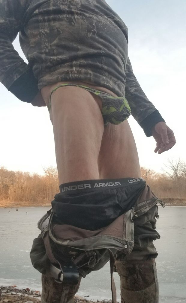 Cock bulge in thong on hike