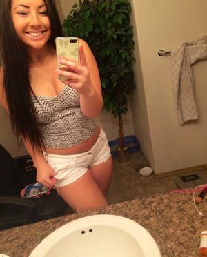 slut in short shorts mirror selfie