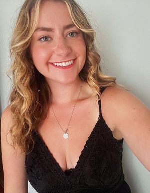 blonde slut black top selfie