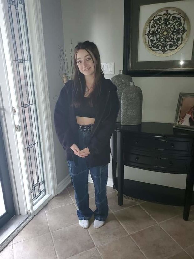 Grace showing belly