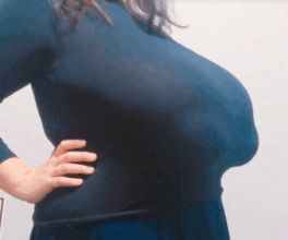 Trying to wear a regular BRA with MASSIVE BREASTS!