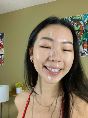 cute asian with cum on her face