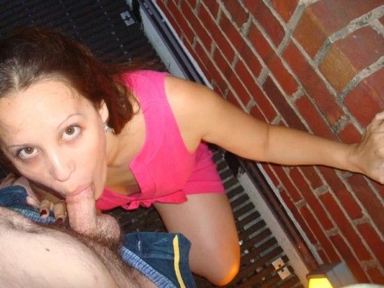 Brunette outside sucking some cock