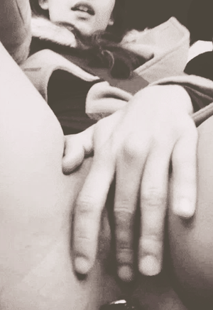 My girlfriend sends me this selfie while i m at work . She is fingering wearing an anal plug