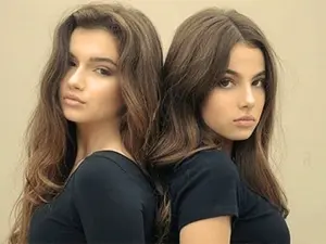 When staying home alone, the two sisters would take out a double-sided dildo, turn on a porno, and start fucking each other.