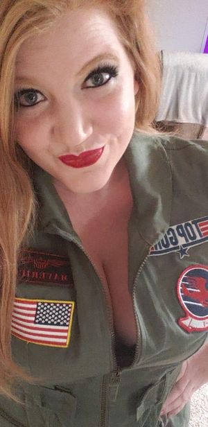 Gorgeous redhead with great tits