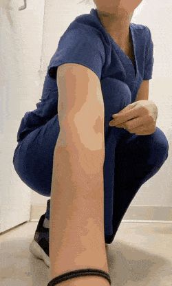 Nurse putting in butt plug