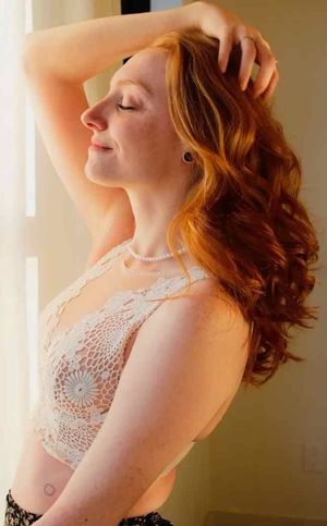redhead goddess posing