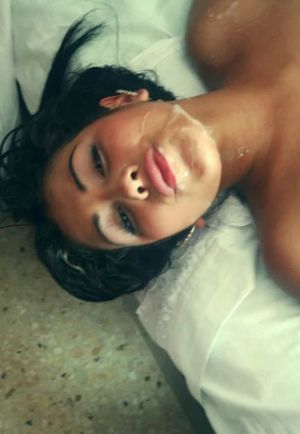 Sexy amateur brunette with cum on her chin