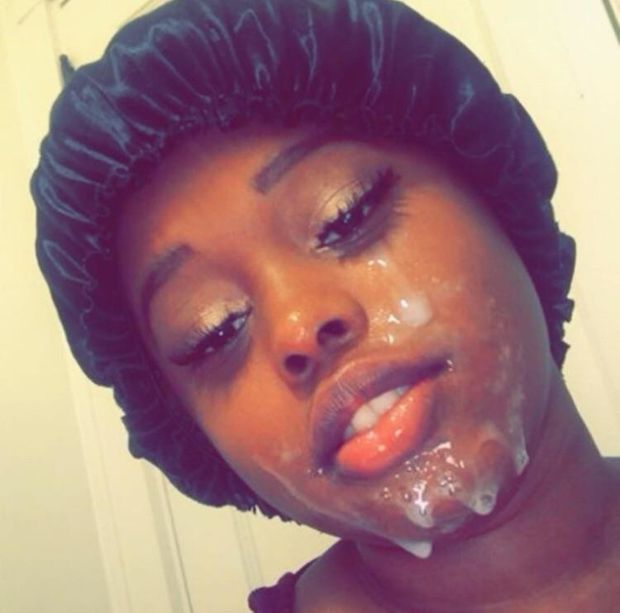Cute ebony with cum all over her face