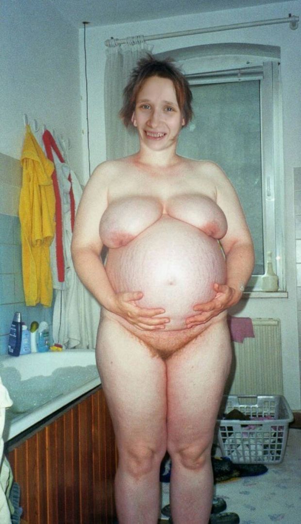 Pregnant milf posing