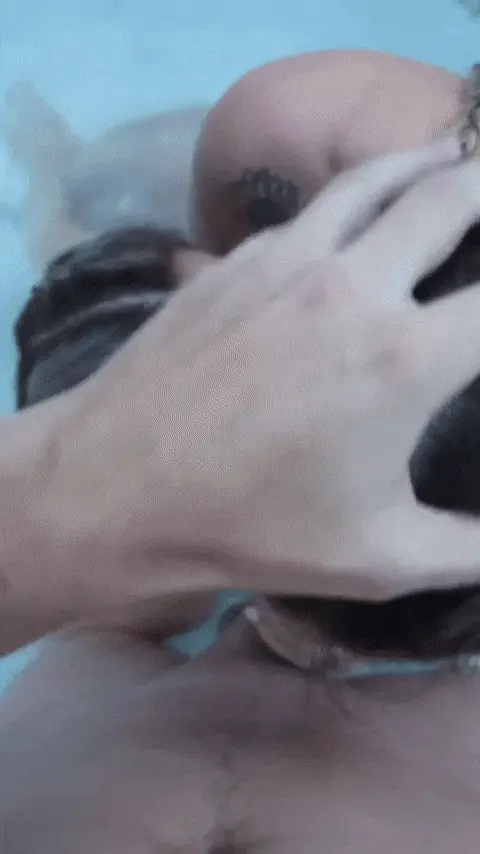 Licking cum off her tit
