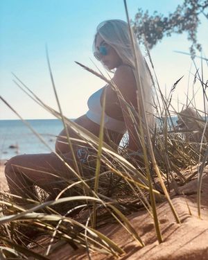 Pregnant at the beach.